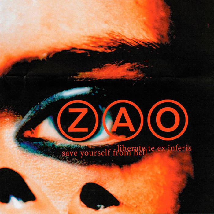 Zao’s Liberate Te Ex Inferis album cover, showing a closeup of Jesse Smith’s hand on his face, with black eye makeup and black nails.